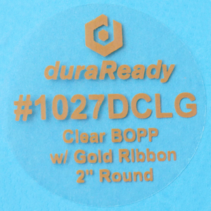 #1027DCLG, clear BOPP with gold ribbon 2" round labels.
