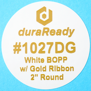 DuraReady's #1027DG, 2" round white BOPP label with gold print.