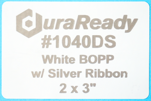 Unique, #1040DS white BOPP with silver print, 2 x 3" labels.